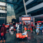 Motul showcased vintage and modern vehicles on their retro-garage-themed stand at the idle Auto Fest, taken by Joe Fleming Bonafide Studio