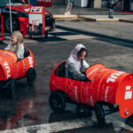 Something for everyone, the kids enjoyed the Motul pedal cars while parents explored the Motul stand and products, taken by Joe Fleming Bonafide Studio