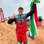 Charan Moore last year, just after he crossed the finish line of the final stage and won the Original by Motul class for Dakar 2023, image by Motul