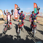 Ross Branch, Ricky Brabec and Adrien Van Beveren at the finish line after 12 stages of the 2024 Dakar Rally, image by Motul