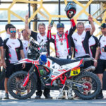 Ross Branch and his Hero MotoSports Team Rally powered by Motul on the podium for 2nd overall in the 2024 Dakar Rally, image by Motul