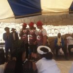 Community Deputy Thethuoe ‘T’ Lelakane in his Motul Bike Wash Extreme Clean shirt (left), introduces manager Craig Kruger (middle) and Brendon Venter (right)